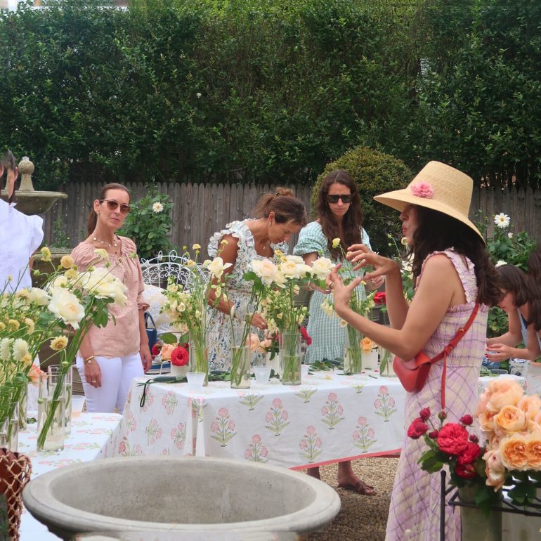 A flower arranging gathering with garden roses